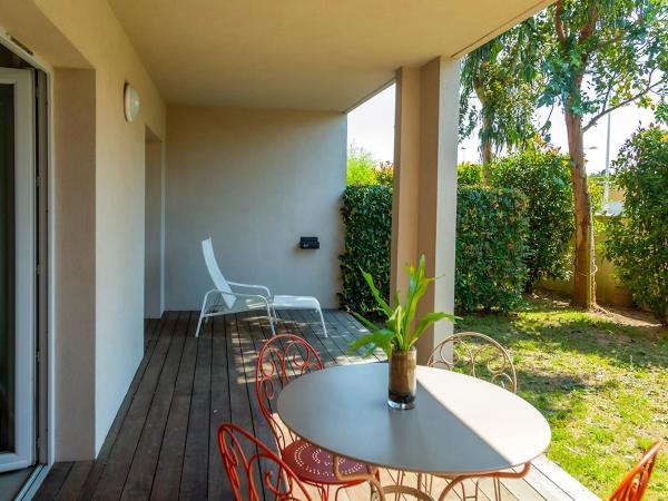 Le Balamina : photo 3 de la chambre suite familiale avec jardin (1 lit double et 2 lits simples)