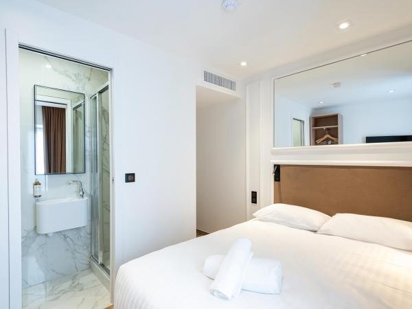 HOTEL AU COEUR DES ARTS ET METIERS : photo 7 de la chambre chambre double – vue sur cour