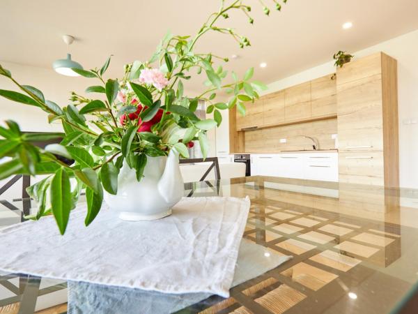 Penzion Kozí Horka u Brněnské přehrady : photo 3 de la chambre suite avec vue sur lac