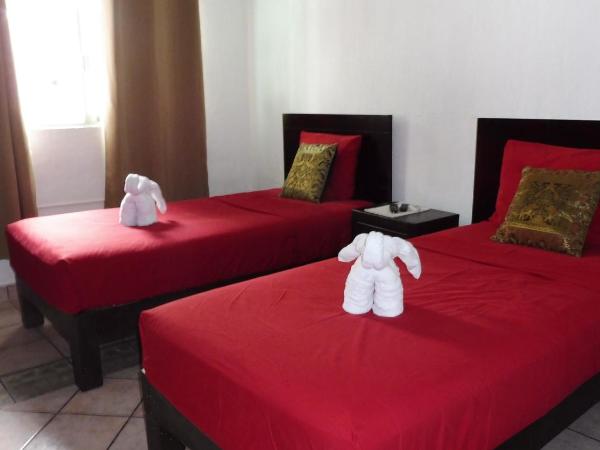 Posada Casa Adriana : photo 1 de la chambre chambre triple avec salle de bains privative séparée