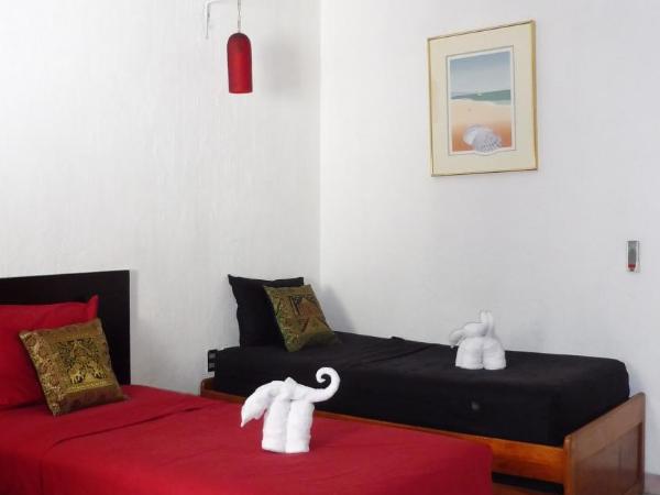 Posada Casa Adriana : photo 2 de la chambre chambre triple avec salle de bains privative séparée