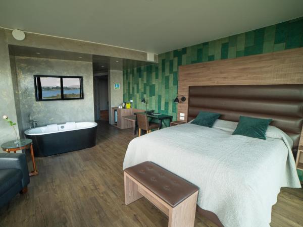 Hotel Kriunes : photo 2 de la chambre suite supérieure lit king-size