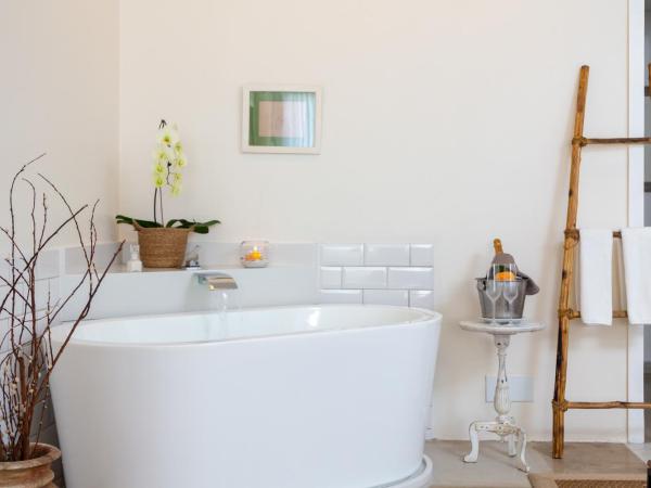 Abracadabra Pousada : photo 5 de la chambre loft suite with bathtub and sea view