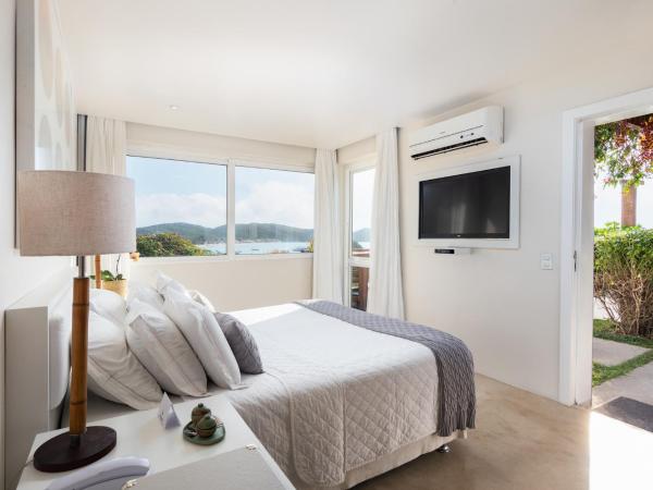 Abracadabra Pousada : photo 9 de la chambre loft suite with bathtub and sea view