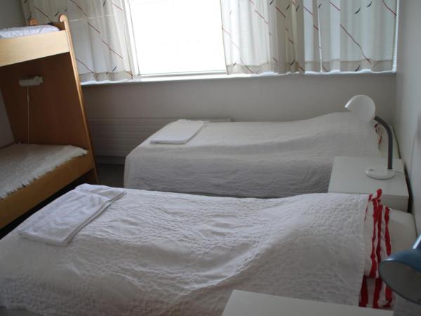 101 Guesthouse Hotel : photo 4 de la chambre chambre familiale avec salle de bains commune
