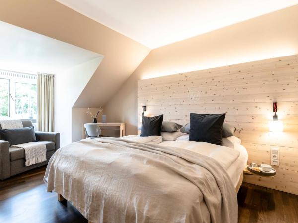 Feldmochinger Hof : photo 3 de la chambre chambre double deluxe (2 adultes + 1 enfant)