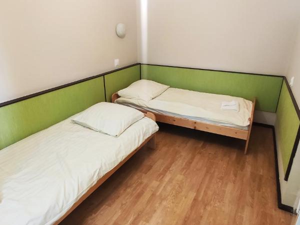 Strzeszynek - wypoczynek : photo 2 de la chambre chambre quadruple avec salle de bains