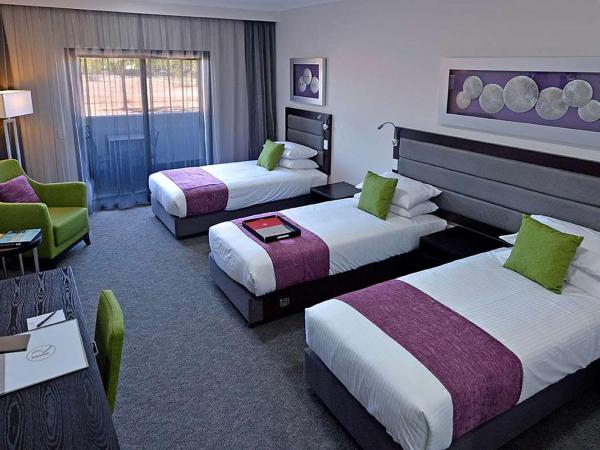 Rydges Palmerston - Darwin : photo 2 de la chambre chambre triple avec balcon