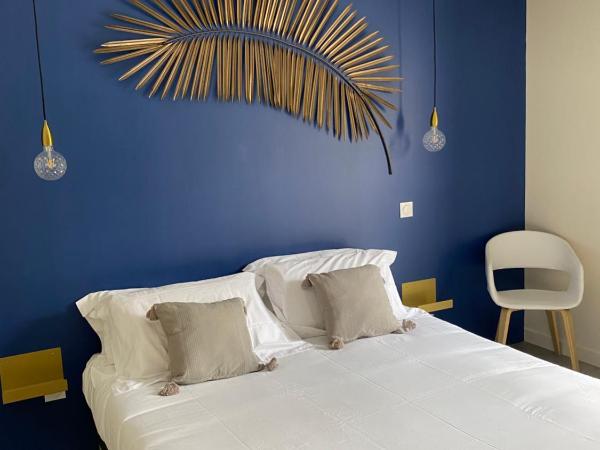 MAISON MIGNARDISE - Cité : photo 4 de la chambre suite junior