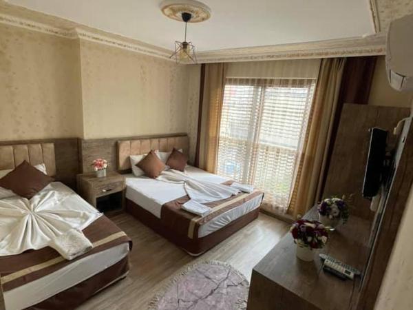 Özgür Hotel : photo 4 de la chambre chambre familiale