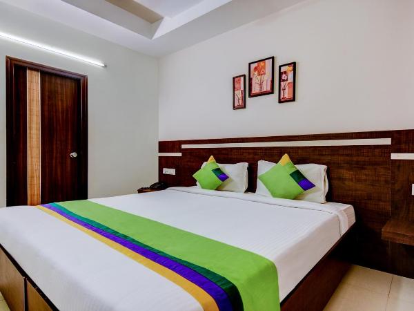 Treebo Primeland Suites : photo 7 de la chambre chambre double standard