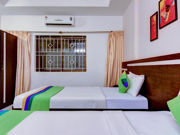 Treebo Primeland Suites : photo 9 de la chambre chambre double standard