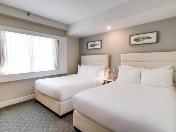 Crest Hotel Suites : photo 1 de la chambre studio avec 2 lits doubles