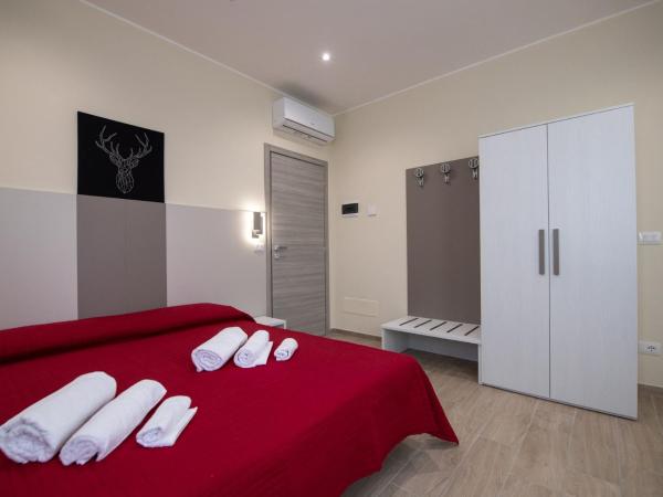 Le PALME : photo 2 de la chambre chambre deluxe double ou lits jumeaux