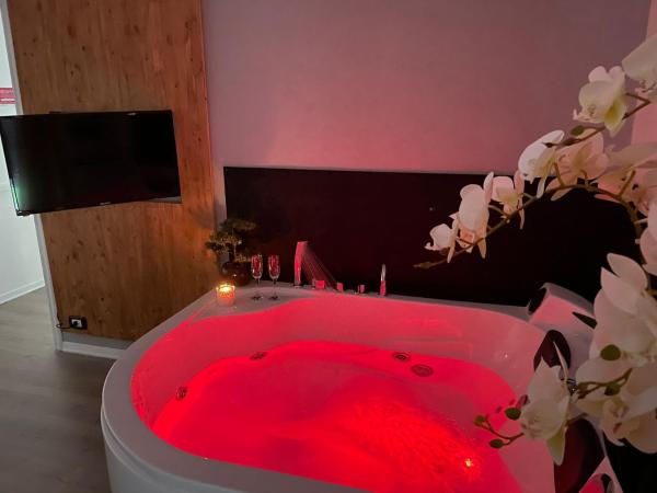 Cavaliere Suite : photo 1 de la chambre chambre lit queen-size avec baignoire spa