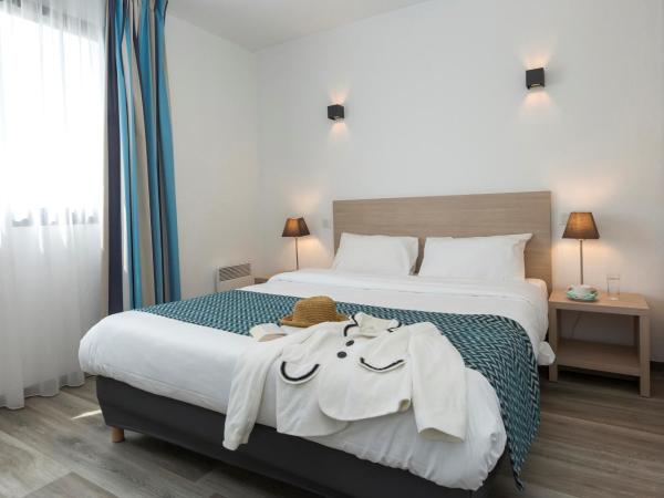 Résidence Odalys Archipel : photo 1 de la chambre appartement familial en résidence