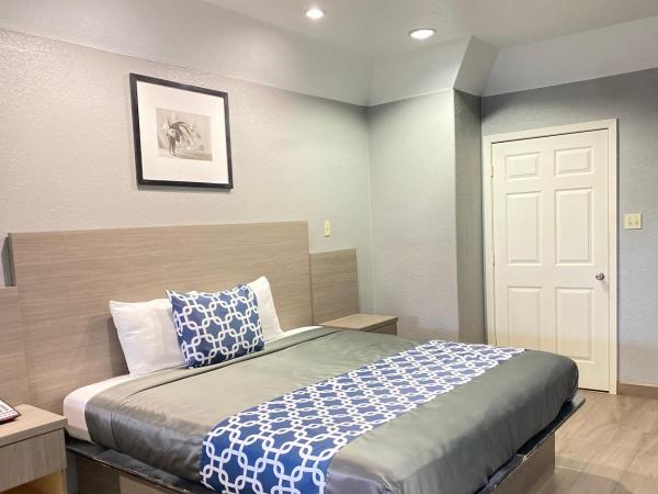 Island Suites Hobby Airport : photo 2 de la chambre suite lit king-size