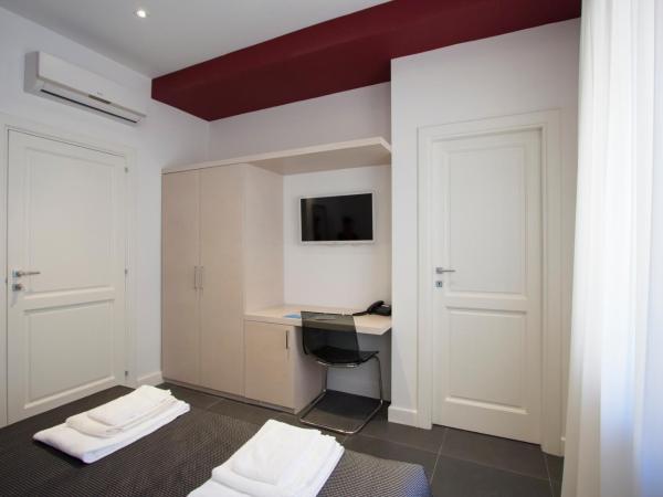Nostos rooms & Apartments : photo 8 de la chambre chambre double ou lits jumeaux