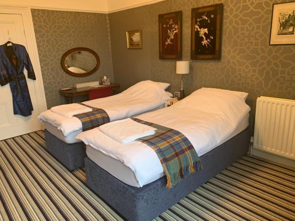 Aberley House : photo 3 de la chambre chambre lit king-size - vue sur mer