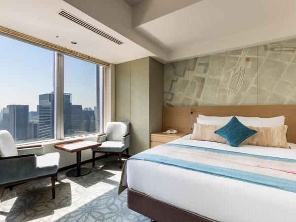 Hotel Metropolitan Tokyo Marunouchi : photo 1 de la chambre hébergement lit queen-size - côté gare