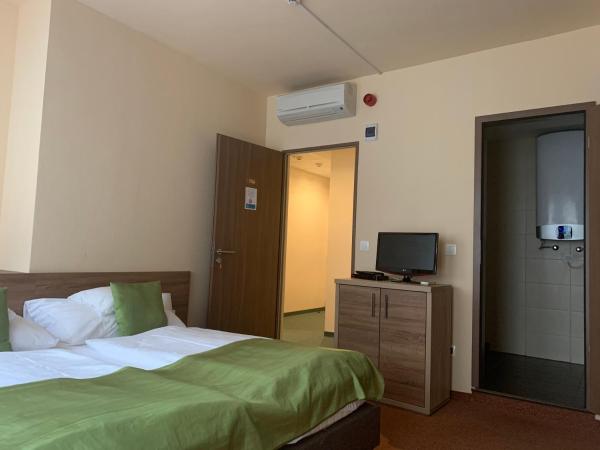 Centrooms Eger : photo 9 de la chambre chambre double ou lits jumeaux standard