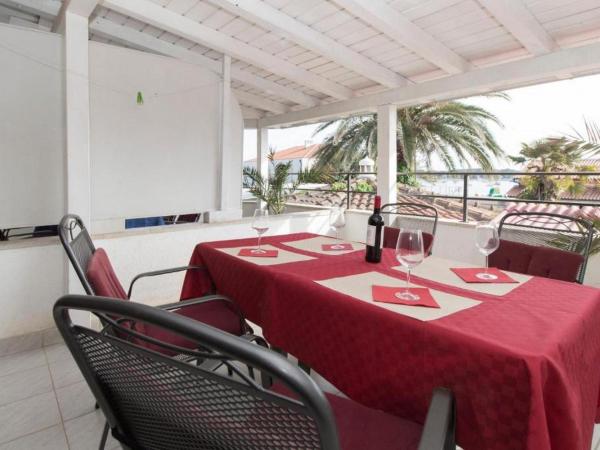 Apartments PALMA Bed & Breakfast : photo 8 de la chambre chambre quadruple - vue sur mer