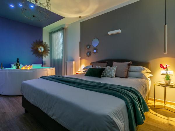 4 Star Suite SPA - Self Check-In : photo 3 de la chambre suite deluxe avec baignoire spa