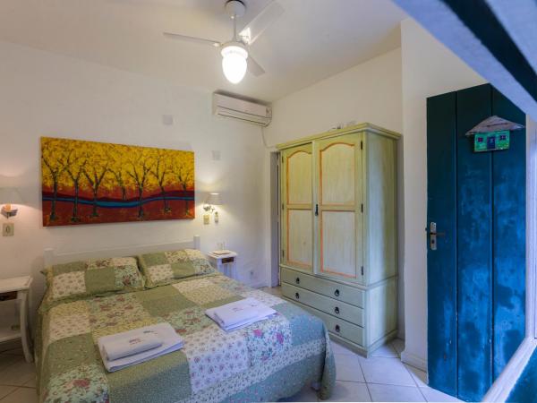 Pousada Chez Nice : photo 4 de la chambre chambre double ou lits jumeaux standard - vue sur jardin