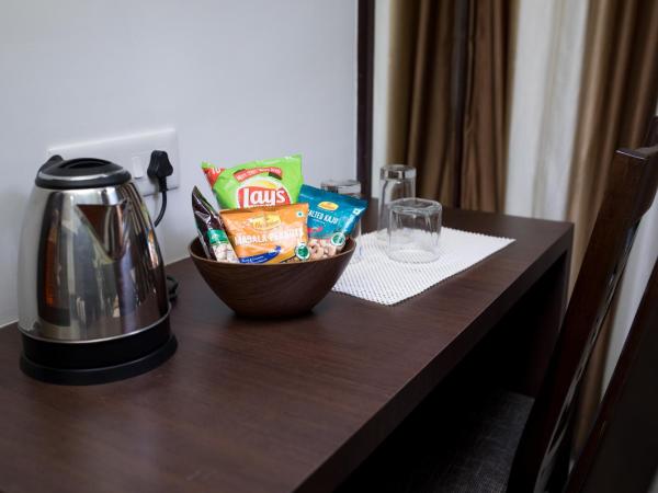 Grand Padappai Residency : photo 10 de la chambre suite deluxe avec lit king-size