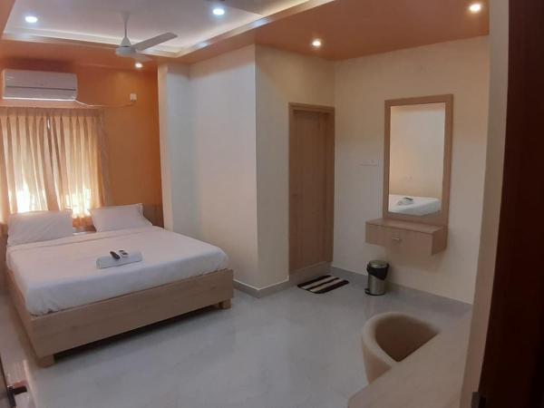 JFIVE RESIDENCY : photo 4 de la chambre chambre deluxe double ou lits jumeaux