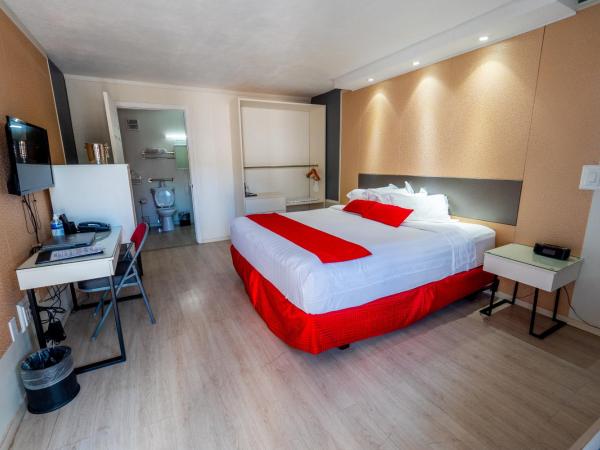 Travelodge by Wyndham Orlando at Heart of International Drive : photo 4 de la chambre chambre lit king-size - accessible aux personnes à mobilité réduite - non-fumeurs