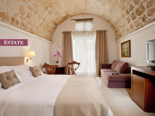 Rimondi Boutique Hotel - Small Luxury Hotels of the World : photo 2 de la chambre suite avec accès au spa - domaine