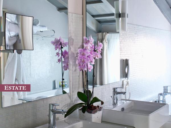 Rimondi Boutique Hotel - Small Luxury Hotels of the World : photo 6 de la chambre suite luxueuse - domaine