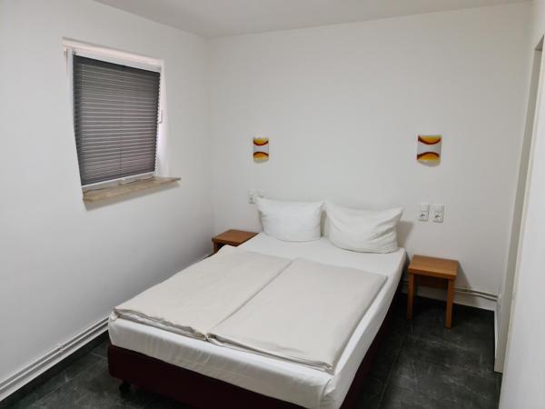 Shop 23 : photo 1 de la chambre petite chambre double