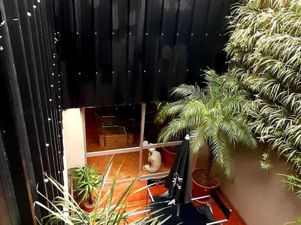 Bucanaan hostel boutique : photo 3 de la chambre chambre familiale avec salle de bains commune