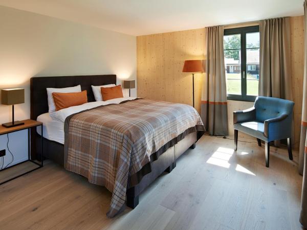 Eiger View Alpine Lodge : photo 1 de la chambre chambre double deluxe avec balcon - vue sur eiger