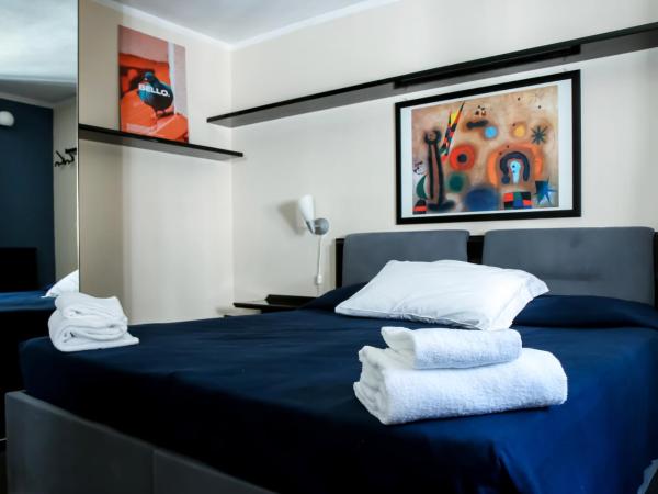 Hotel Britannia : photo 1 de la chambre chambre quadruple avec salle de bains privative