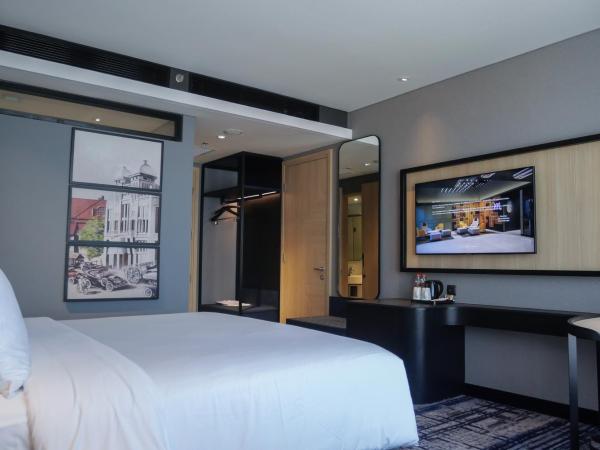 Mercure Surabaya Manyar : photo 5 de la chambre deluxe queen room - city side