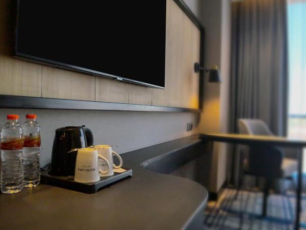 Mercure Surabaya Manyar : photo 3 de la chambre deluxe queen room - city side