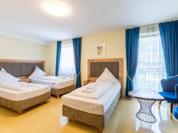 Hotel Arena : photo 2 de la chambre chambre triple standard