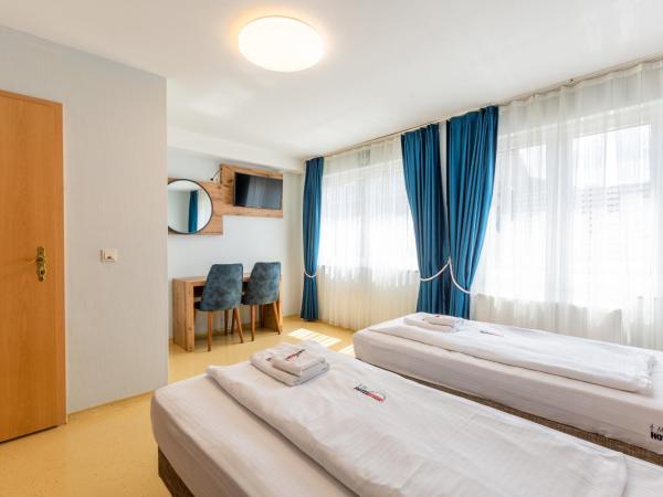 Hotel Arena : photo 6 de la chambre chambre lits jumeaux