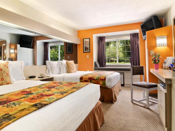 Hometown Inn & Suites Jacksonville Butler Blvd./Southpoint : photo 1 de la chambre chambre deluxe avec 2 lits queen-size