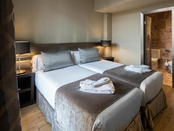 Catalonia Portal de l'Angel : photo 4 de la chambre chambre double ou lits jumeaux avec terrasse