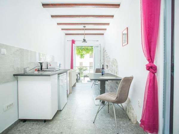 Garden Apartment Hotel : photo 7 de la chambre chambre double ou lits jumeaux supérieure avec terrasse