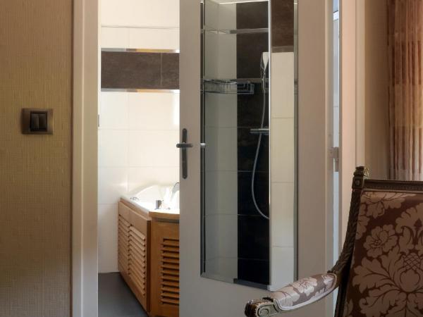 Domaine du Clos Fleuri - Spa : photo 4 de la chambre chambre double deluxe avec baignoire