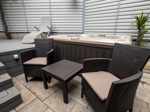 Arena Deluxe & Spa : photo 8 de la chambre suite deluxe avec baignoire spa