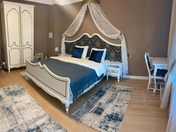 Villabaroque_Eger : photo 3 de la chambre chambre deluxe (2 adultes + 1 enfant)