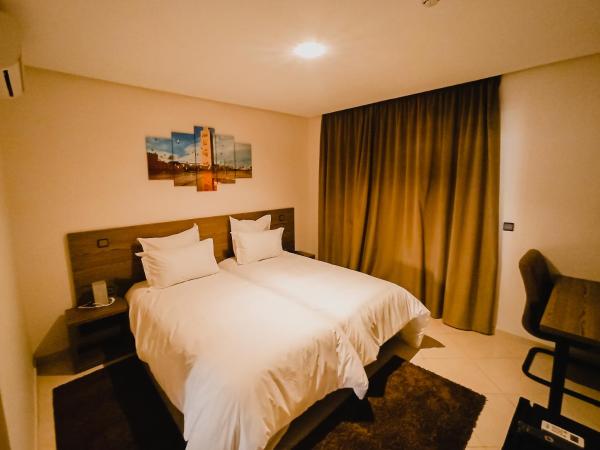 EL MOUSSAFIR HOTEL : photo 1 de la chambre chambre lits jumeaux