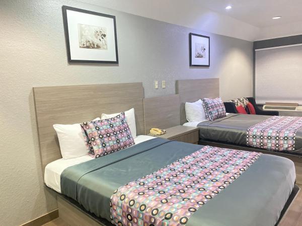 Island Suites Hobby Airport : photo 2 de la chambre suite avec 2 lits queen-size