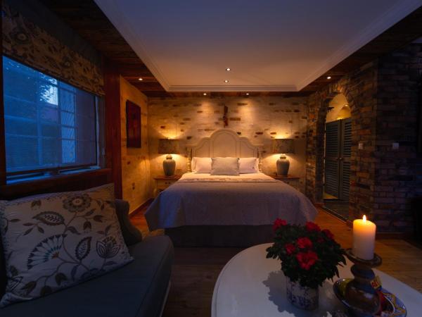 Paul's Fantasia Boutique Suites : photo 1 de la chambre suite lit queen-size deluxe